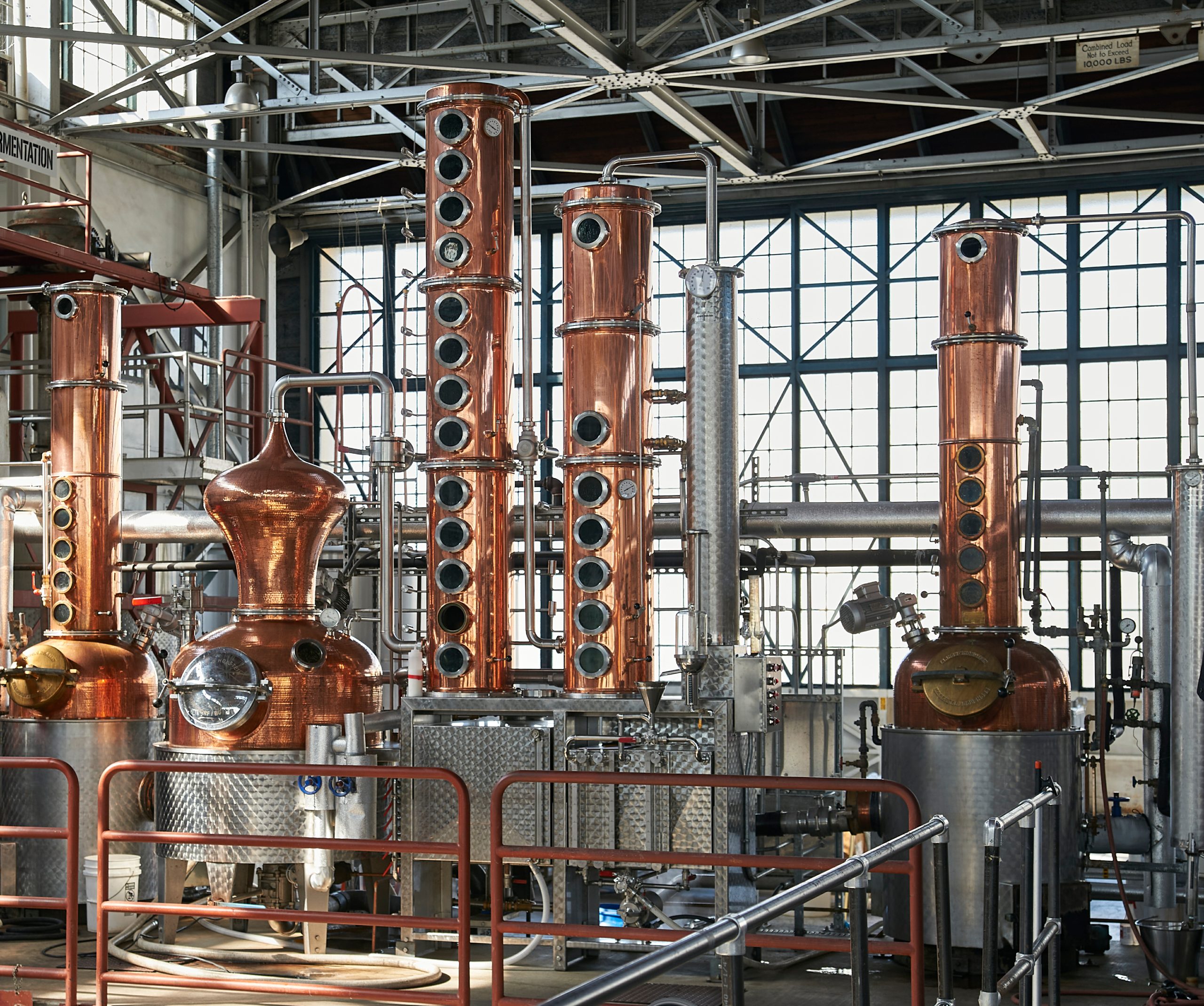 stills in a warehouse distillery